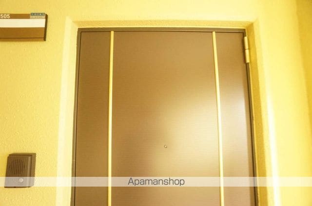 テイネ1・4マンションの玄関写真