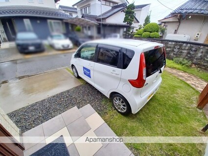 長野県安曇野市豊科南穂高[1R/14.3m2]の駐車場1