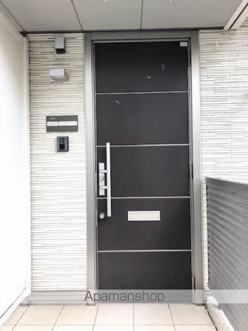 シャーメゾンαの玄関写真