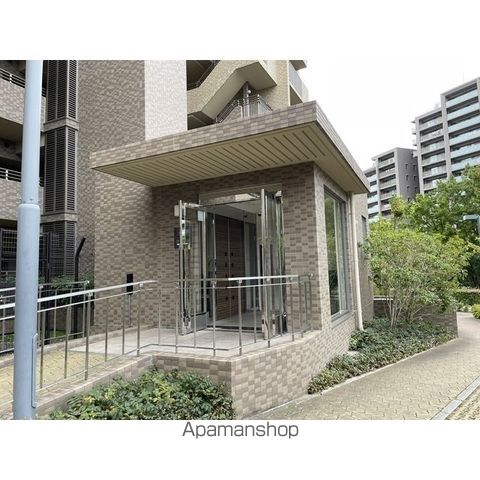 新千里桜ヶ丘メゾンシティ壱番館の外観写真