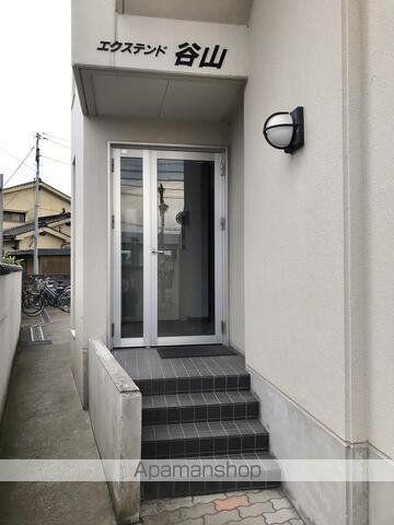エクステンド谷山の玄関写真