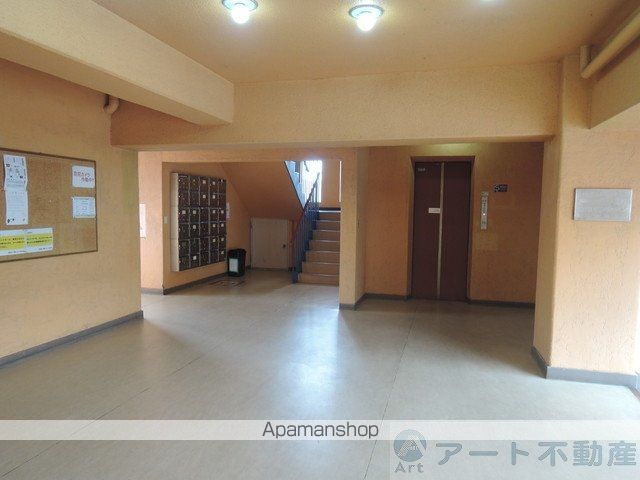 衣山第1マンションの玄関写真