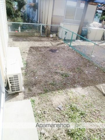 ルーミー甲府40号館の玄関写真