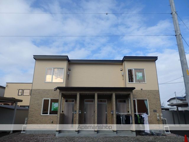帯広市 2階建 築9年の玄関写真