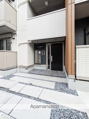 コンフォール西鶴間4丁目の玄関写真