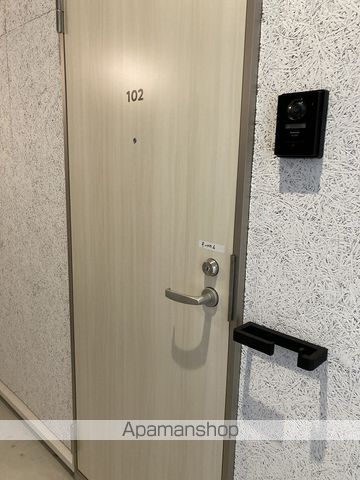 ディアウェンズ高志の玄関写真