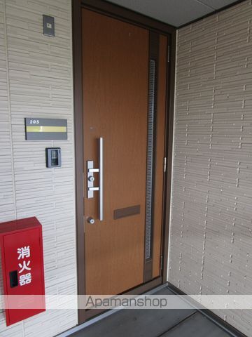 グランマスト古志原 A棟の玄関写真