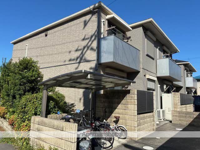 サンヒルズ阪奈A棟の外観写真