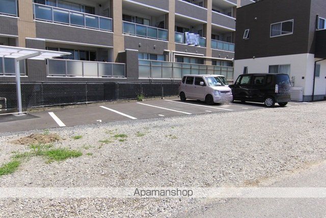 Ｂｅｌｇｒａｖｉａ朝生田ｐｒｅｍｉｕｍ[1DK/34.4m2]の駐車場1