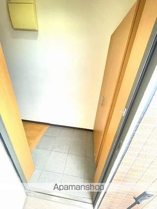 マンション麻績[3LDK/68.09m2]の玄関