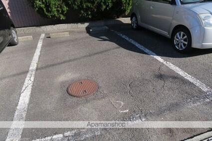 コンフォール[1R/21m2]の駐車場