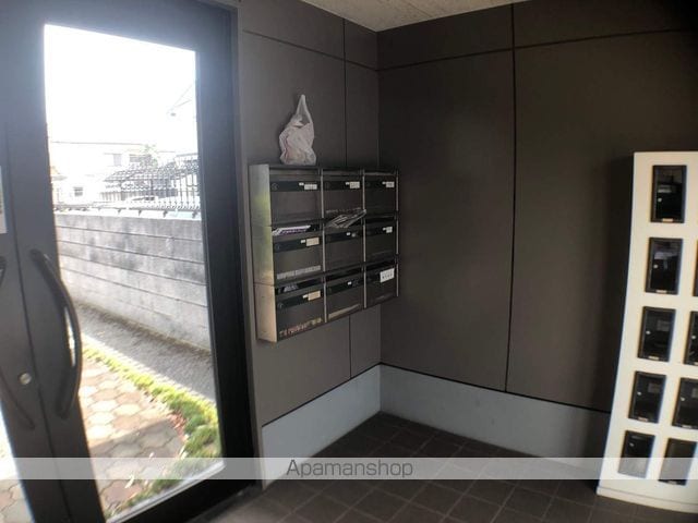 メンバーズタウン草戸IIIの玄関写真
