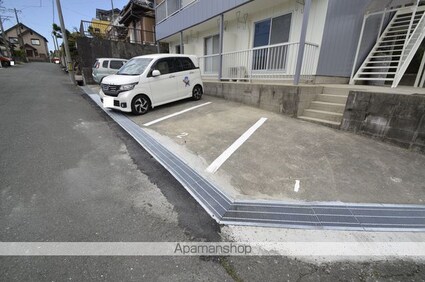 サンパーク都[1R/21m2]の駐車場