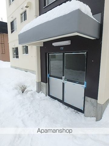 テレパレス北郷白石駅前1号棟の玄関写真