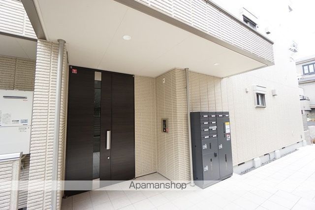 Q’Sメゾンの玄関写真