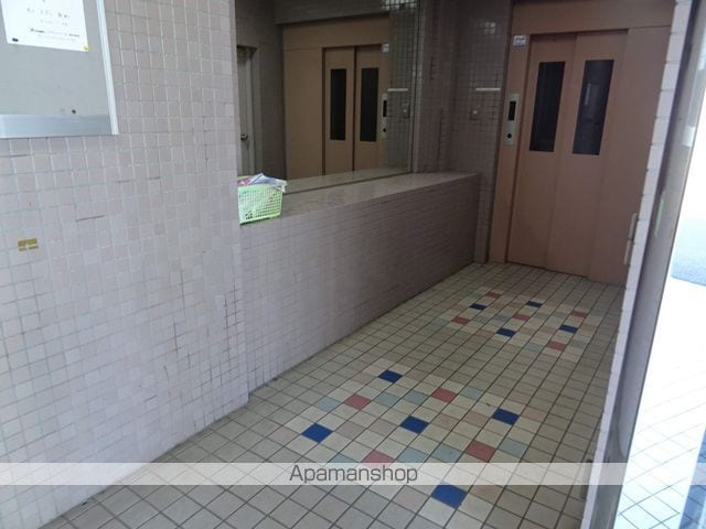 キャピタル萩野町の玄関写真
