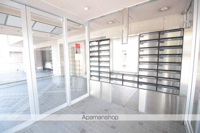 ビッグバーンズマンションN11の玄関写真