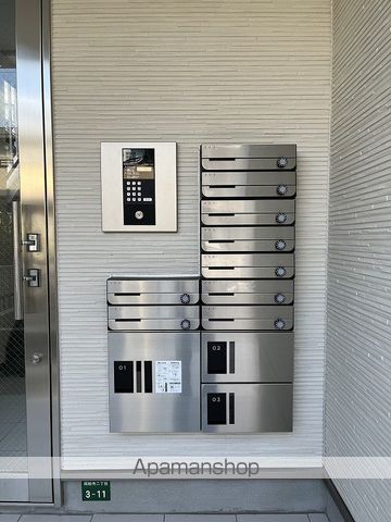 プルメリア周船寺駅前の玄関写真