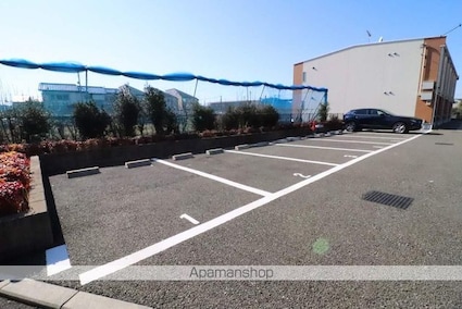 レオネクストハイム　トミ[1R/33.7m2]の駐車場