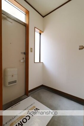 ファミーユロータス[2LDK/57.94m2]の玄関