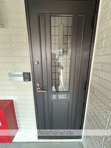 コゥジィーコートの玄関写真