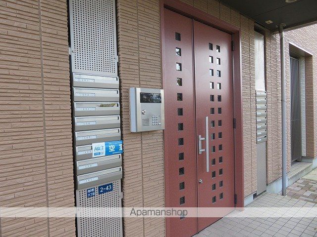 メゾンマスト盛南IIIの玄関写真