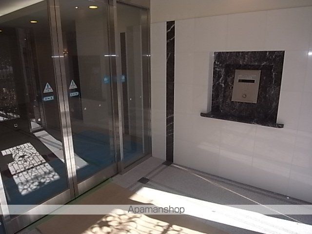 プレサンス名古屋STATIONアブソリュートの玄関写真
