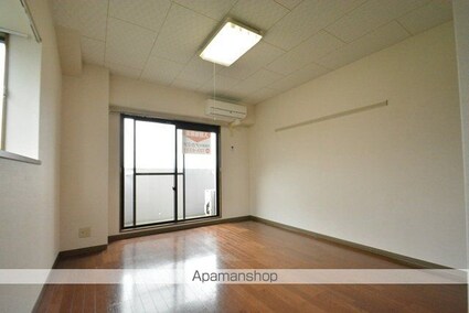 ファミーユ小松島[1K/27.13m2]のリビング・居間