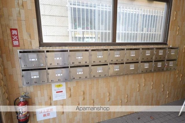 トミーズマンションの玄関写真