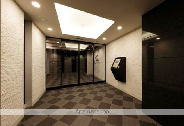 ファステート玉造駅前ダミュウの玄関写真