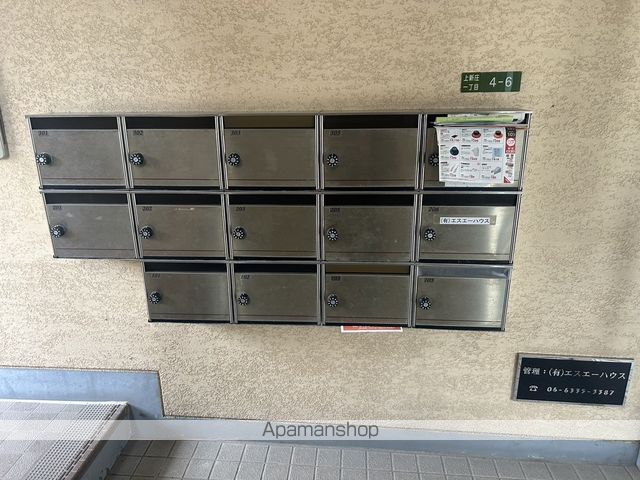 ミスターK上新庄の玄関写真