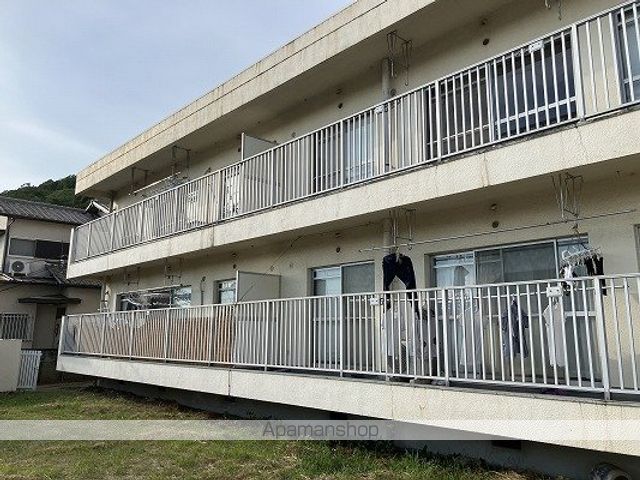 西新在家マンションの外観写真