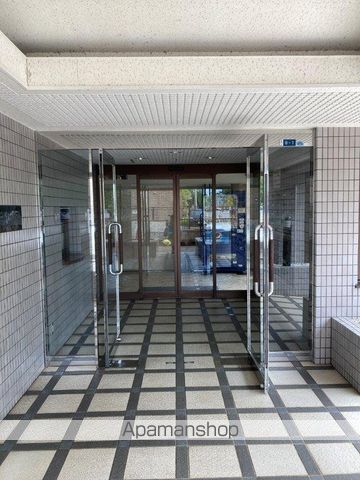トーカンキャステール長岡駅東の玄関写真