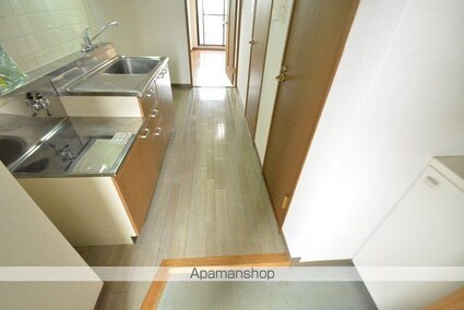 ファミーユ小松島[1K/27.13m2]の玄関