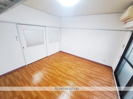 ラッセルスクエア松山市駅　Ａ・Ｂ棟[2K/36.5m2]のリビング・居間