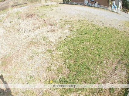 メゾン辰野町[1K/23.18m2]の駐車場