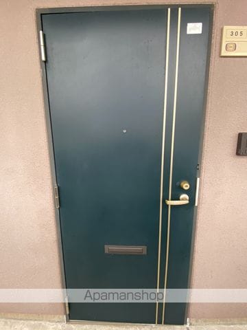 鯉田マンションの玄関写真