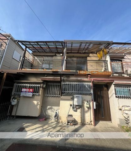 西野110-31テラスハウス 左の外観写真
