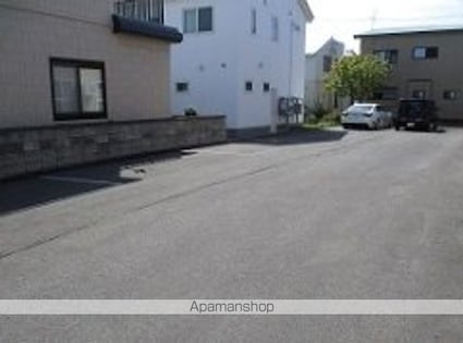 レオパレス３３３[1K/23.18m2]の駐車場1