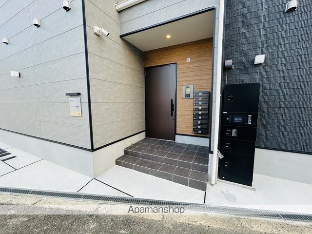 ハーモニーテラス豊里の玄関写真