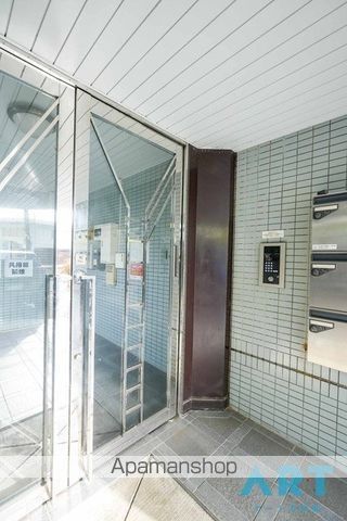 ファミール道後姫塚の玄関写真