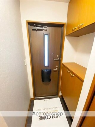 ロイヤルガーデンミルフィー　Ｂ棟[2LDK/55.45m2]の玄関