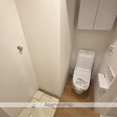 春風と窓辺のカプチーノの内装写真