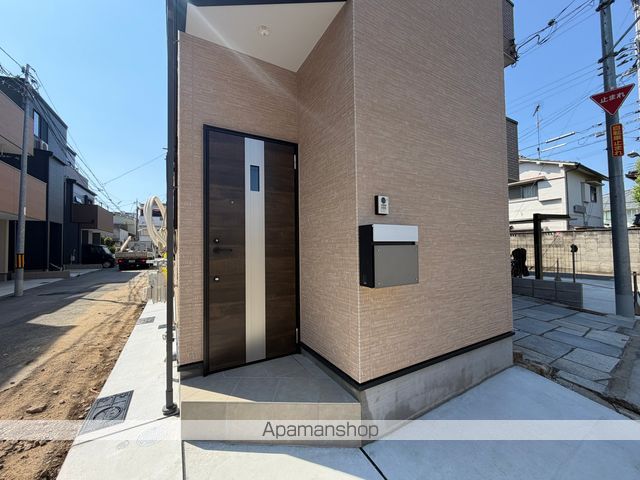 SUN生三番館の玄関写真