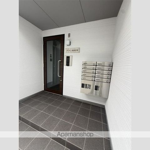 グラン寝屋川の玄関写真