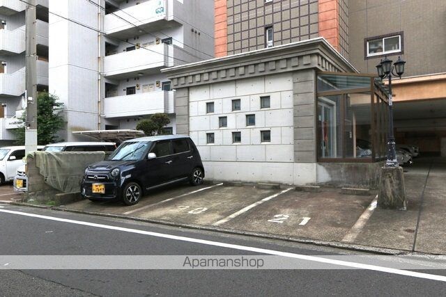 シェレナ朝生田[1DK/35.7m2]の駐車場1