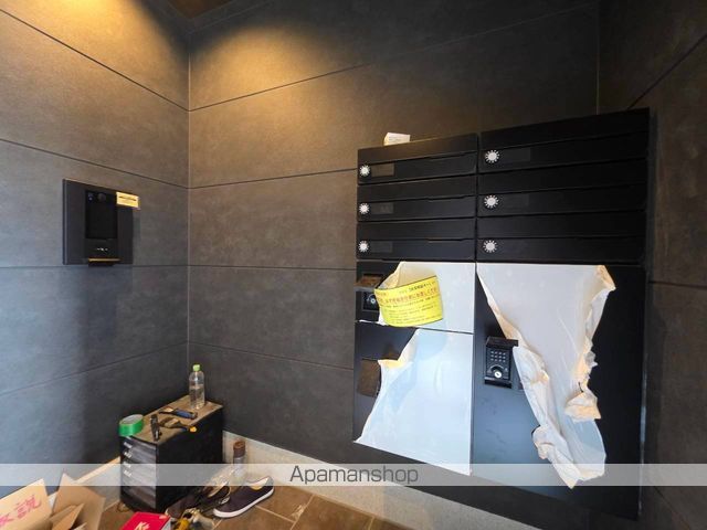DーROOMベルポートの玄関写真