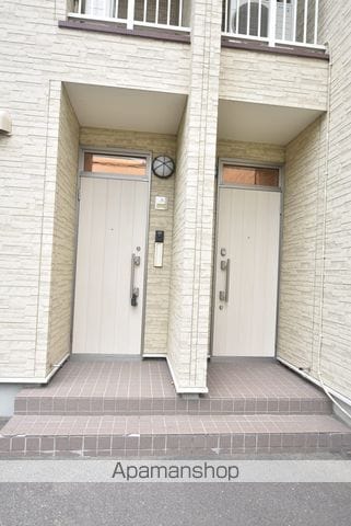 オーパスツーの玄関写真
