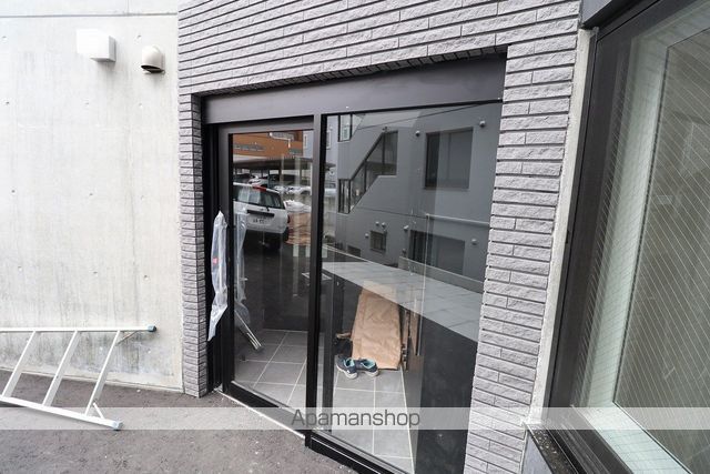 メニーズコート南郷13STの玄関写真
