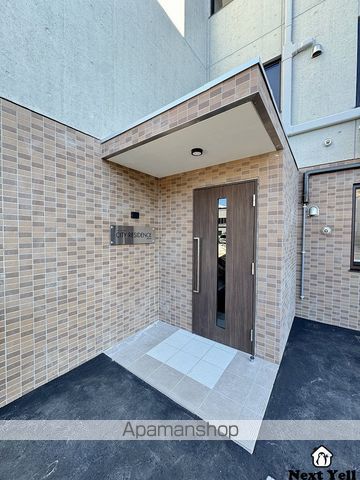 CITY RESIDENCE月寒中央の玄関写真